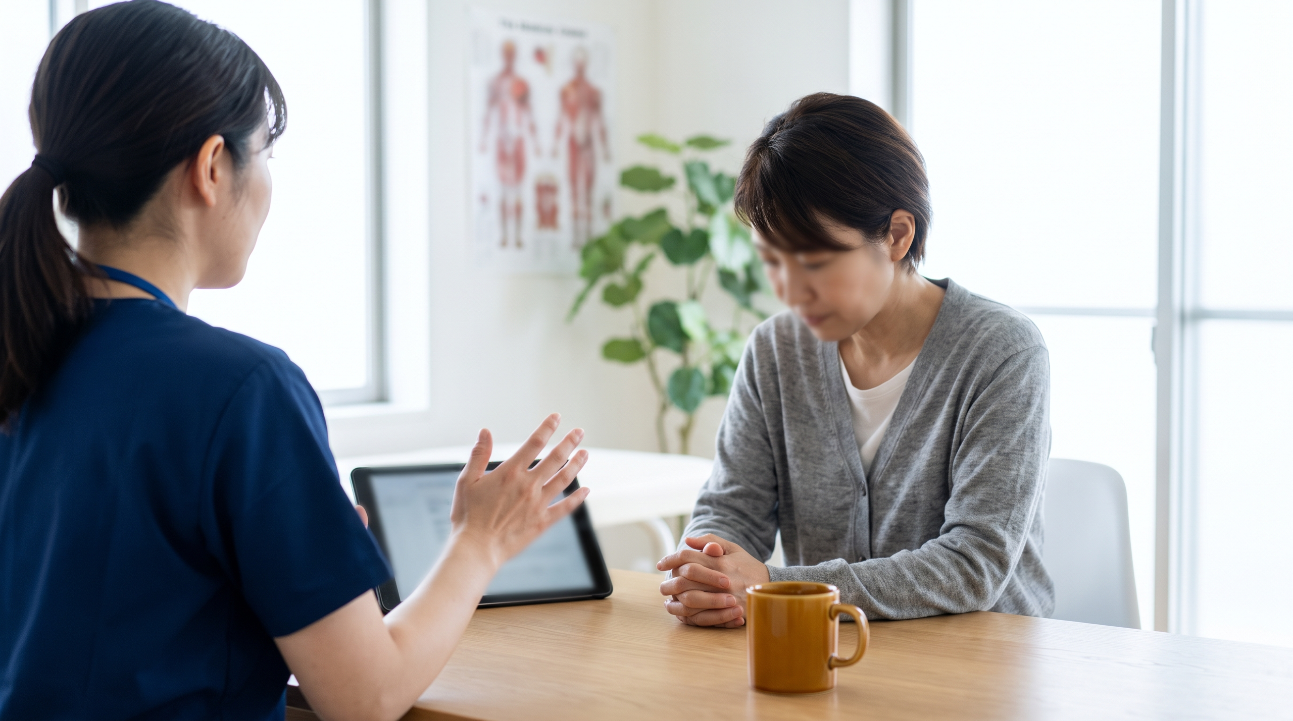 Healthcare professional talking to a patient about GLP-1 medications.