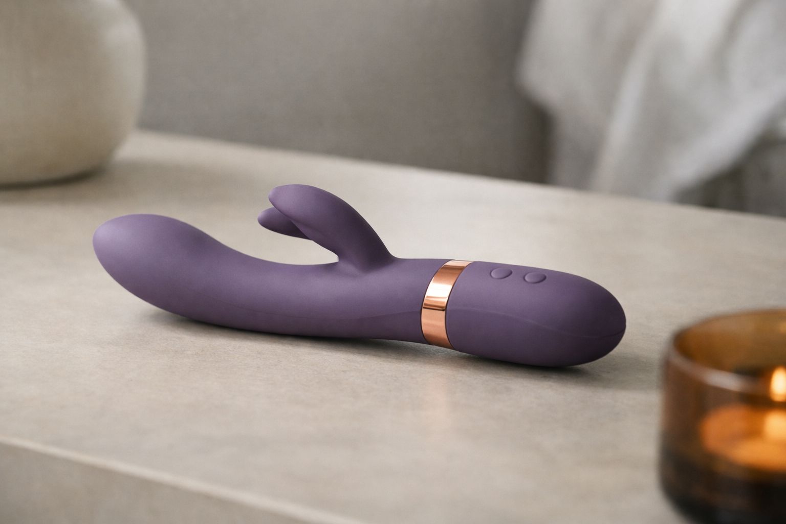 A rabbit vibrator on a clean, modern background.