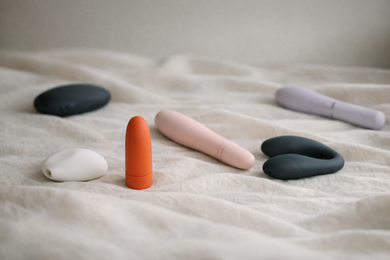 A collection of quiet vibrators on a neutral background.